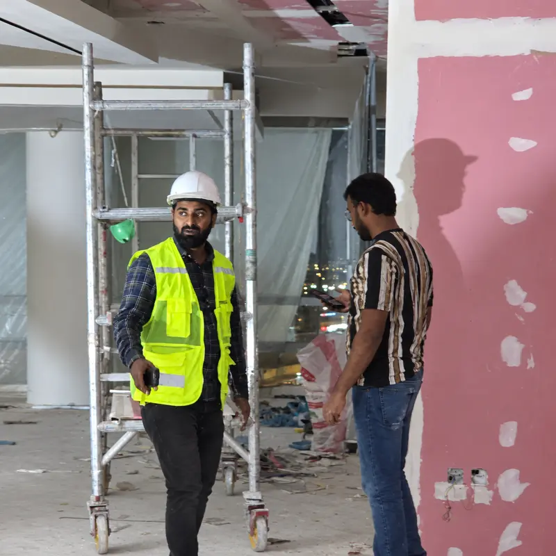 On-site discussion during interior renovation works.
