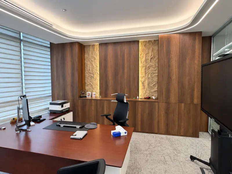 Timber wall finishes, textured feature panels and integrated lighting.