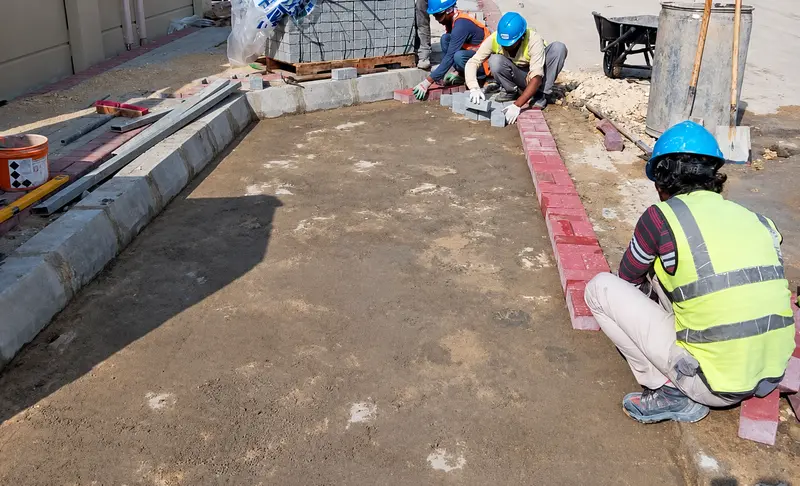 Edge-course alignment and preparation for interlocking pavers.